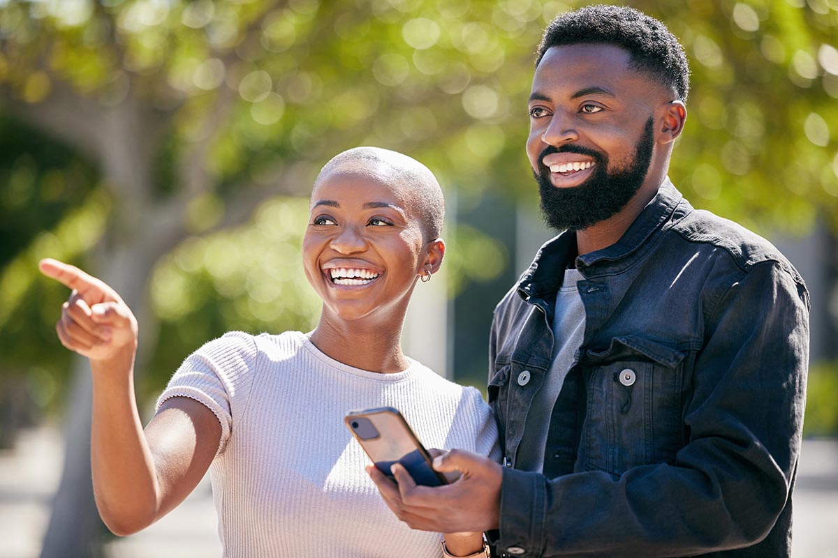 Bonding man and woman in urban town for technology, social and happiness together.